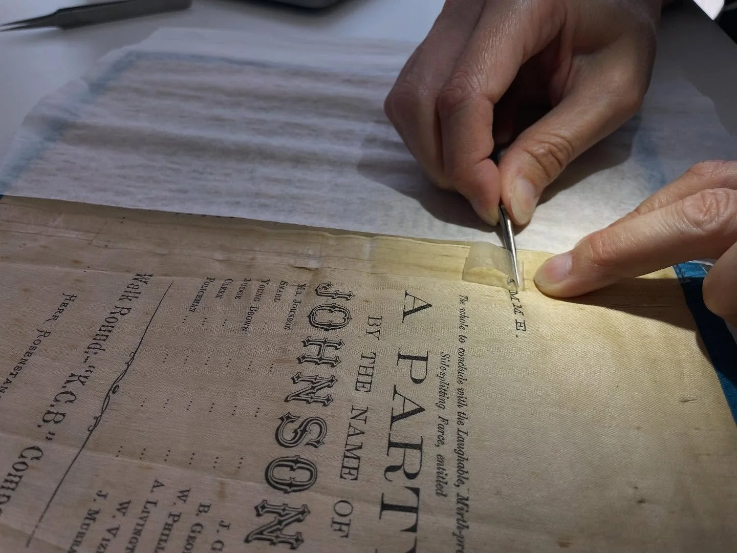 I have come across a few textiles that have historical pressure sensitive tape being used support splits and to hold them together. This is from the @rhs_qld collection, a silk program from 1878 with adhesive tape down the centre. Most of the pressur