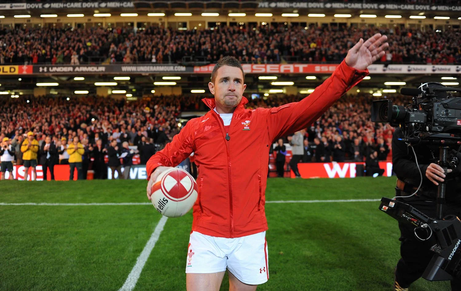 Shane Williams of Wales leads his side out in his final test match