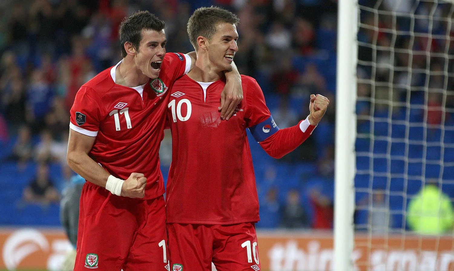 Wales' Aaron Ramsey celebrates with Gareth Bale after scoring