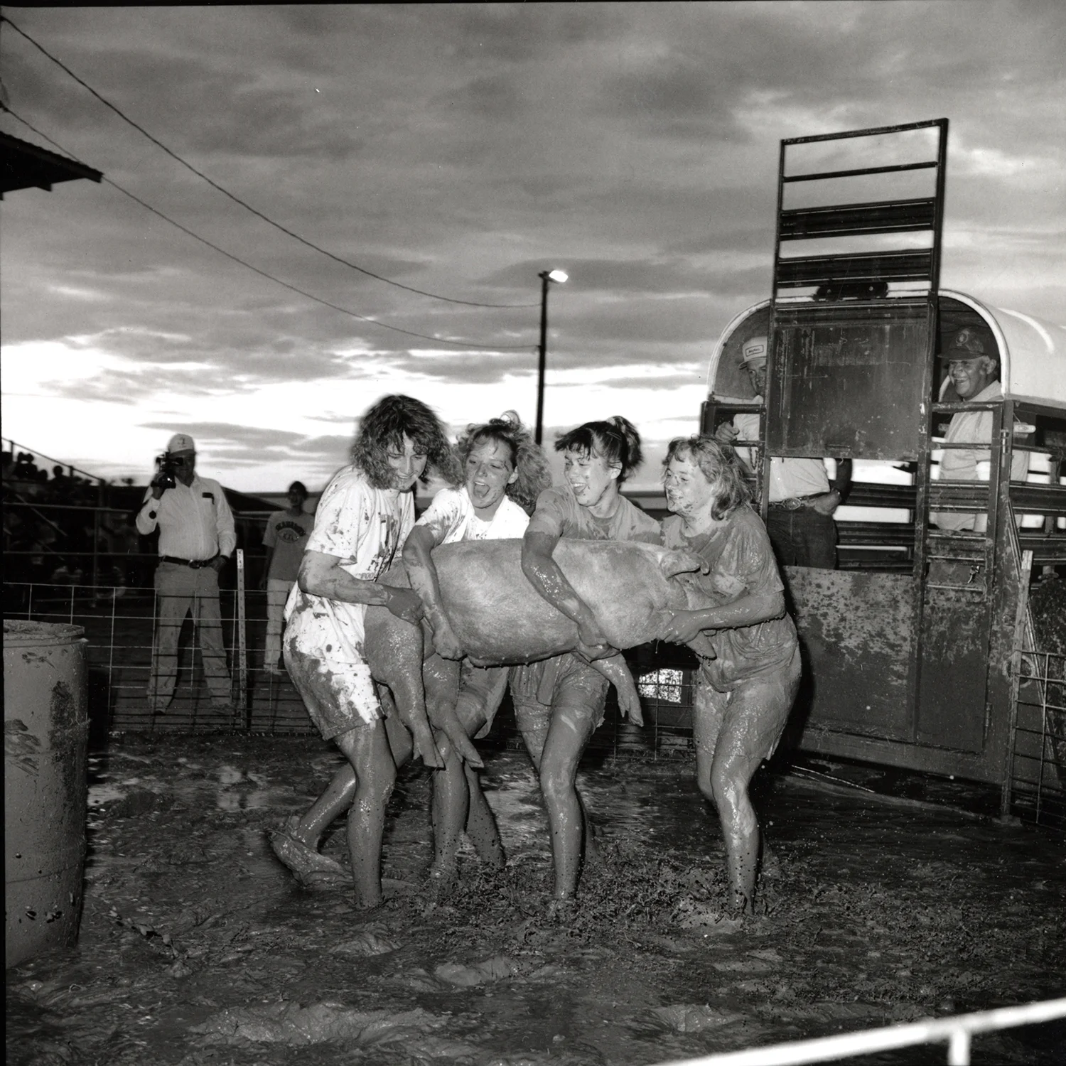 Girls with Muddy Pig, Wheatland, Wyoming, archival pigment print, 16x20, 1989
