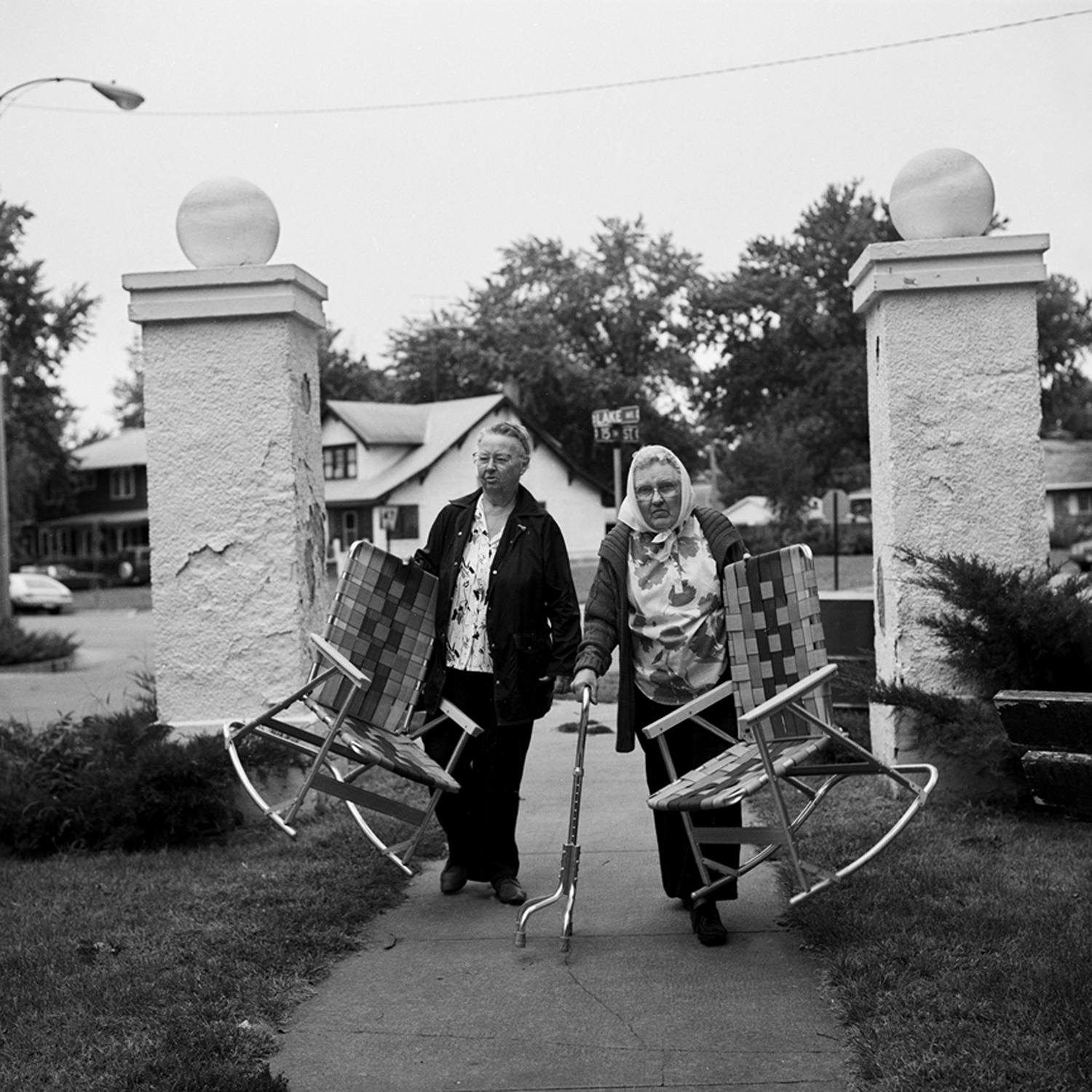 Women with Lawn Chairs, Gothenberg, Nebraska, archival pigment print, 16x20, 1988