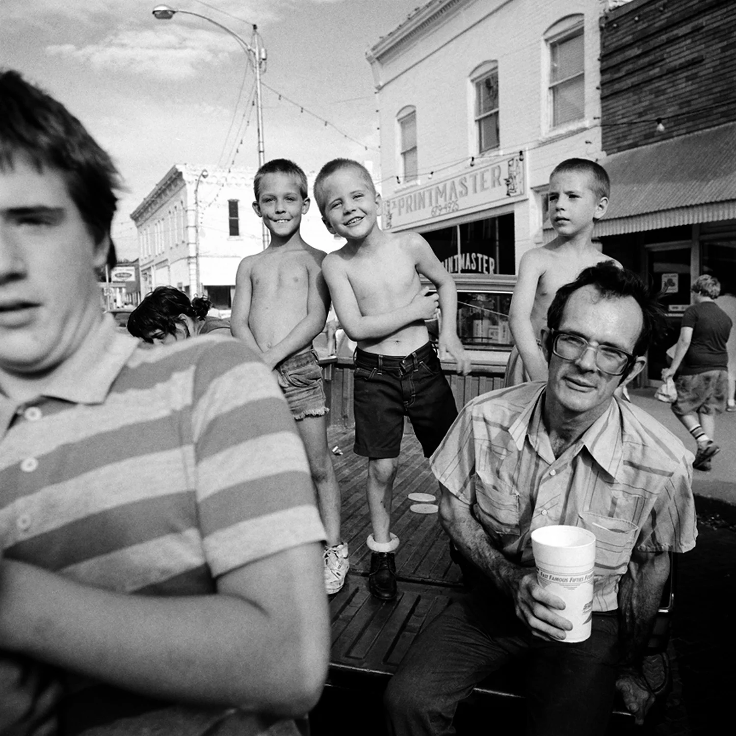 Boy with Rolled Socks, Butler, Missouri, archival pigment print, 16x20, 1990