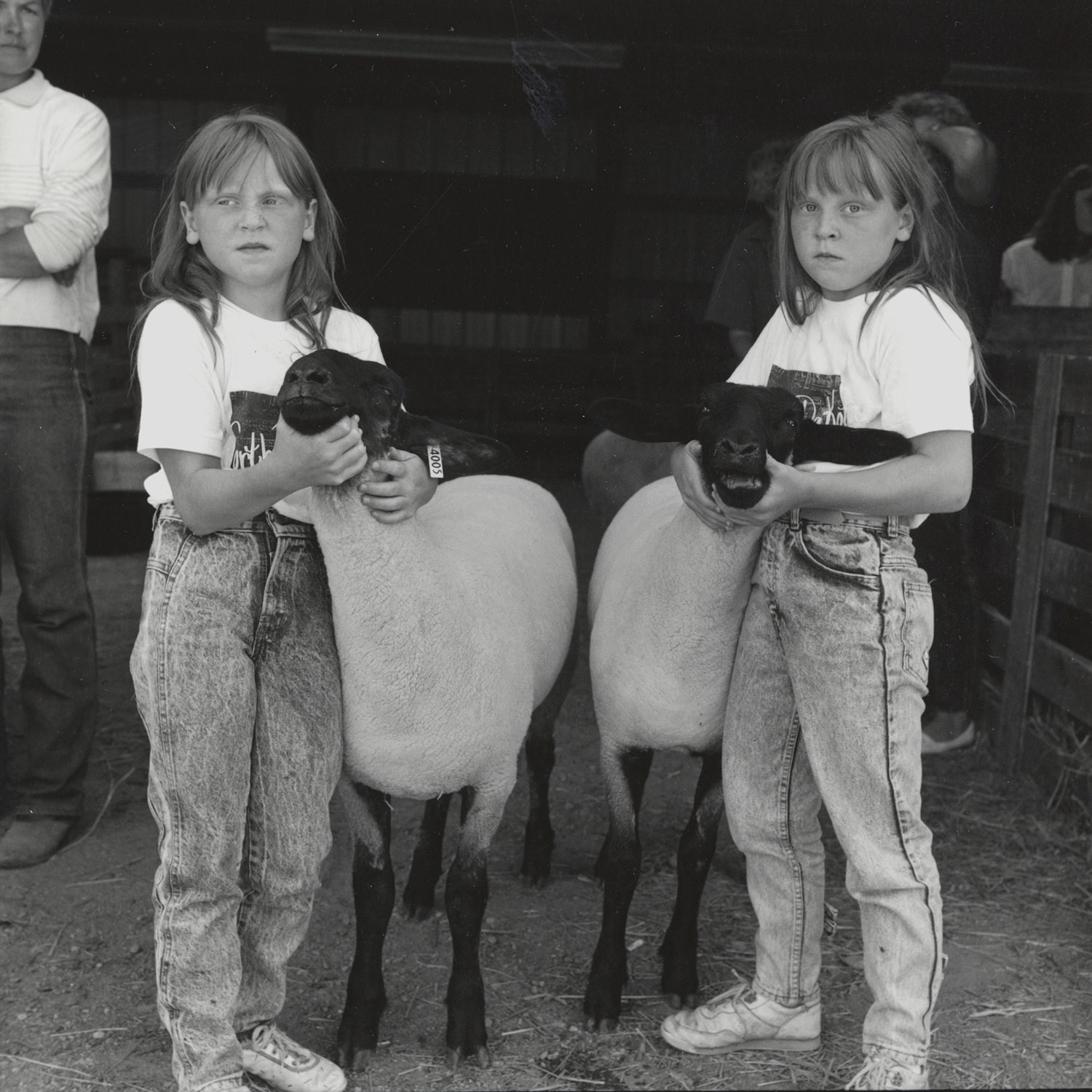 Twins with Sheep, Cooperstown, North Dakota, archival pigment print,16x20, 1989