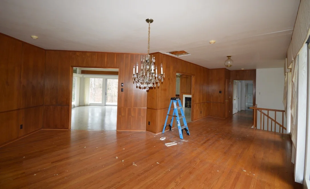 This entry and dining space will be opened up to the living room and given a face lift along with new flooring.