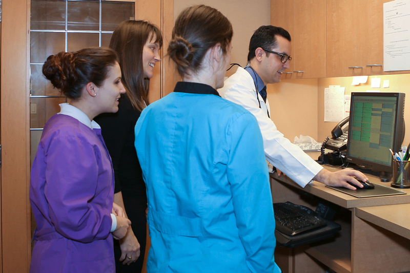 Seattle Dental Studio staff discussing treatment options