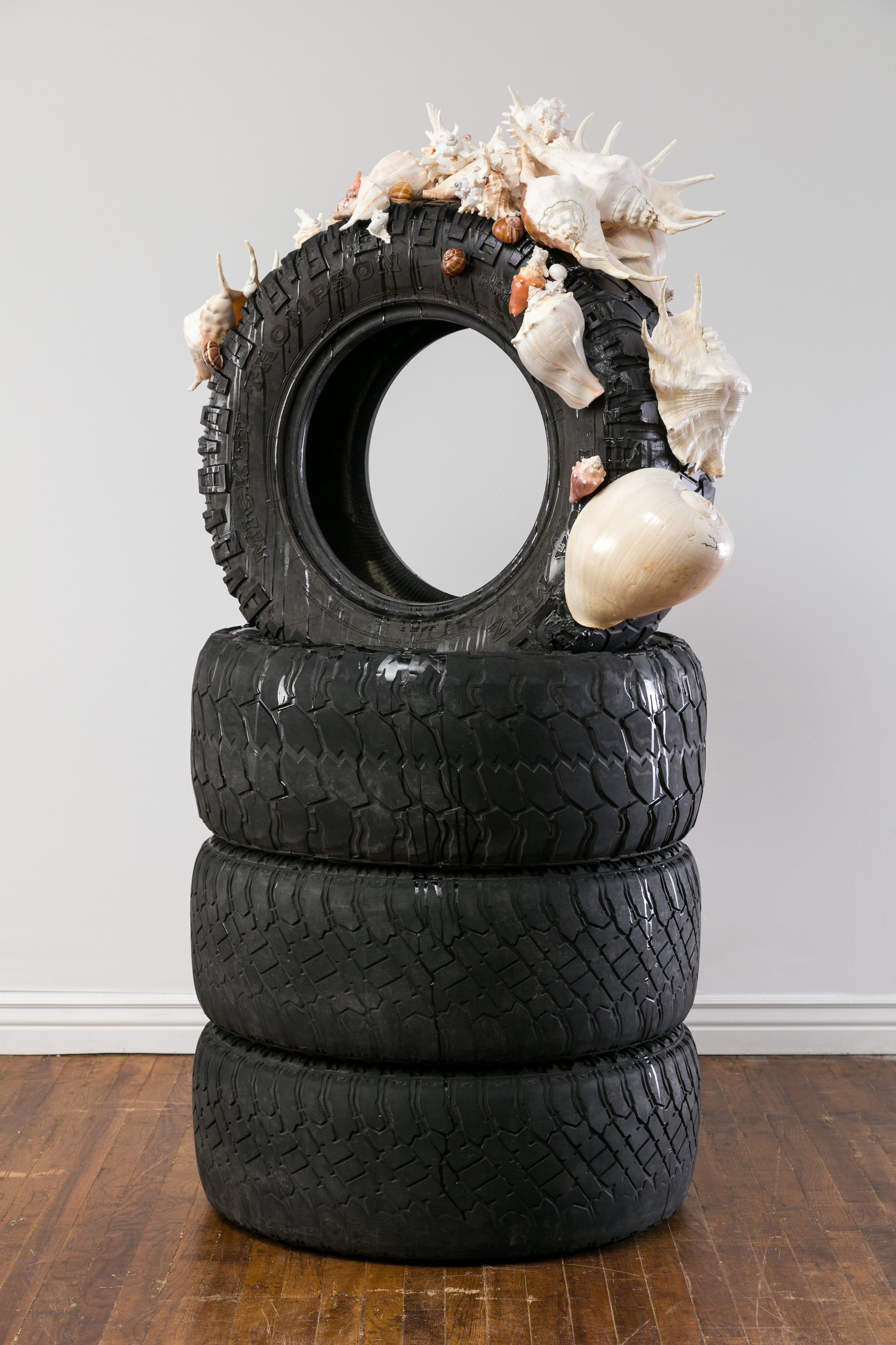 "Failing Mountain", 67"x40"x32", truck tires, shells, varnish, resin