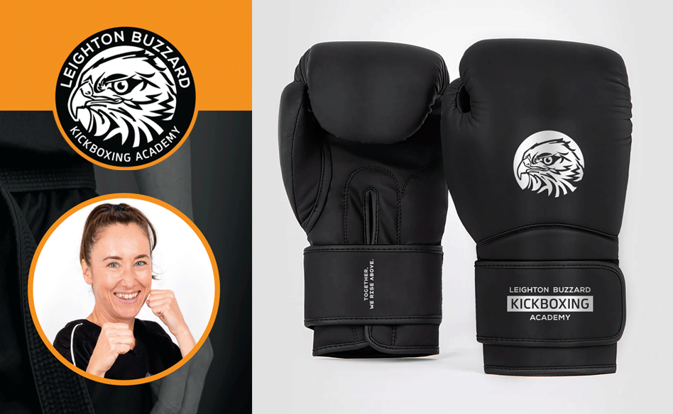 A pair of black boxing gloves with Leighton Buzzard Kickboxing Academy logo, alongside a promotional poster featuring a smiling woman – Jo Randall Sensei and Chief Instructor of Leighton Buzzard Kickboxing Academy, in stance, plus the academy's logo.