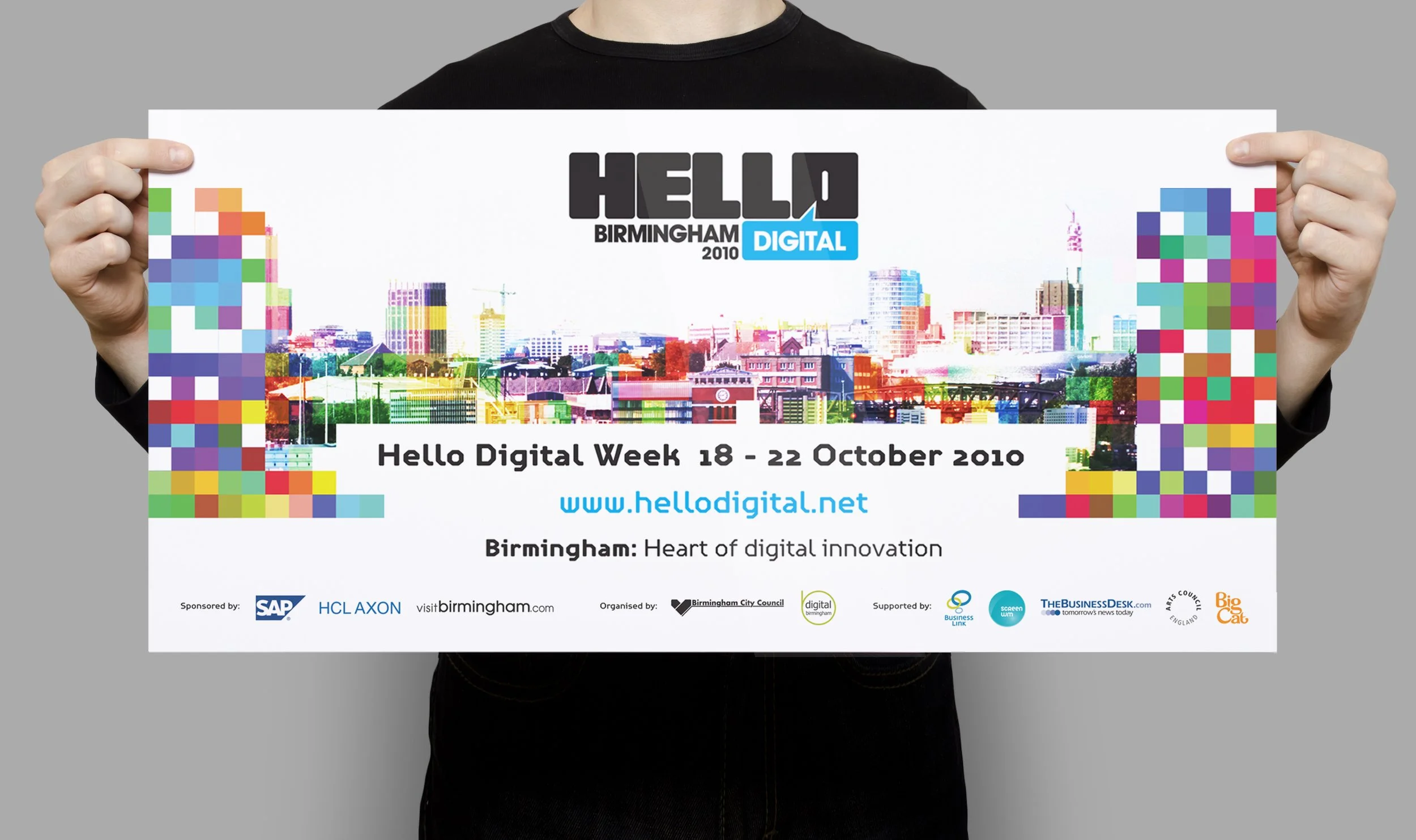 Poster for Hello Digital Week in Birmingham October 2010, featuring a colorful cityscape and pixelated graphics.