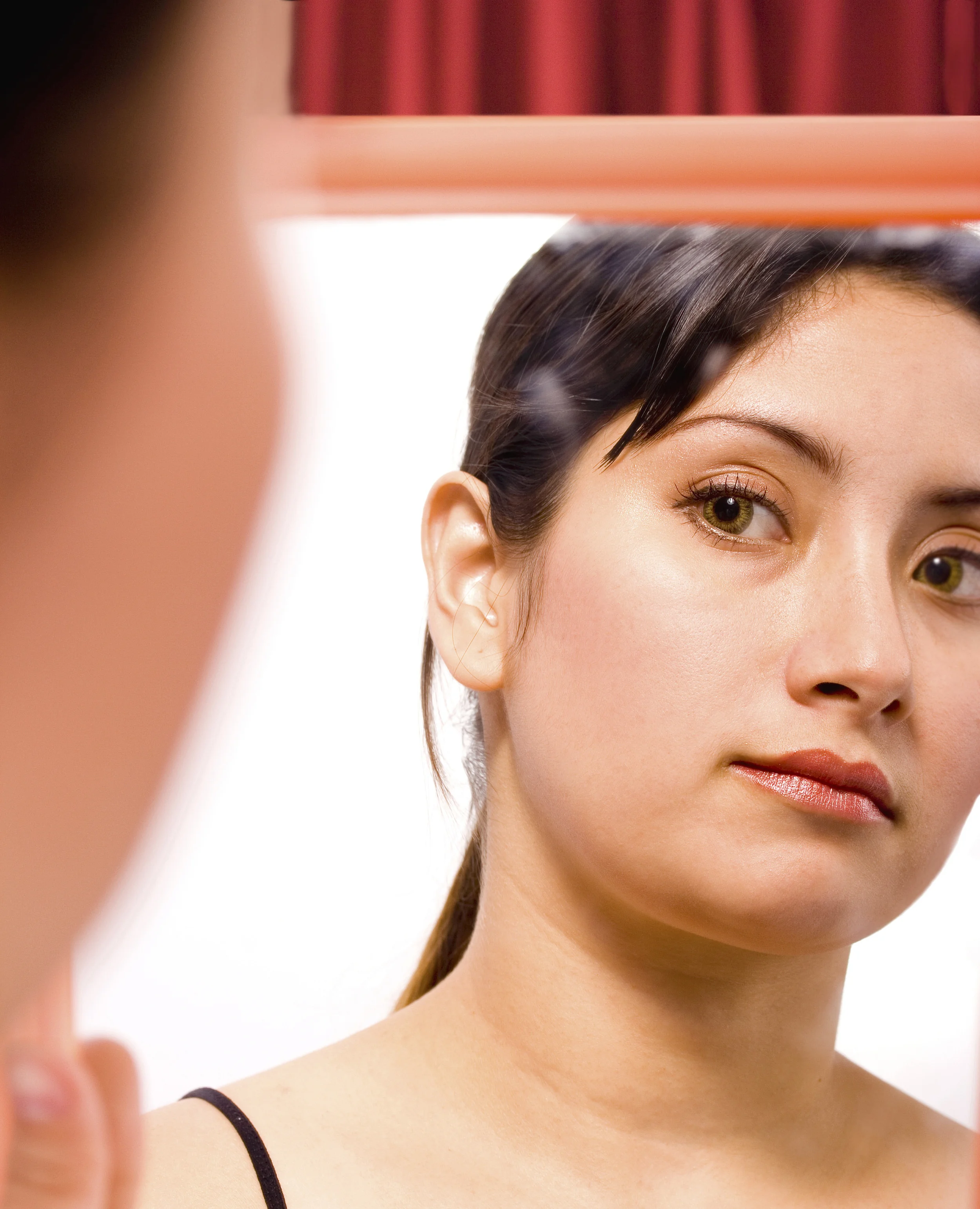 girl-looking-at-herself-in-the-mirror_f1no6NP_ (2).jpg