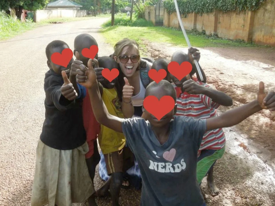 Here I am at 19 on my first volunteer trip abroad, posing for a photo with kids I didn’t really know.