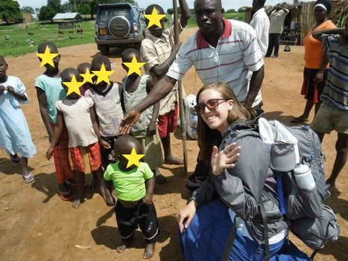 Here I am with a bunch of kids from Nakasongola. I have no idea who any of them are and didn’t think twice about asking their parents for photo permission…this kid in the green is obviously concerned.