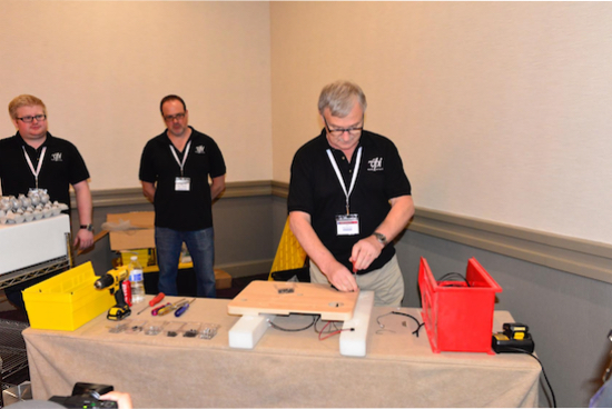 VPI technicians gave a demonstration of how to actually build a Nomad Turntable; a large crowd came by to see.
