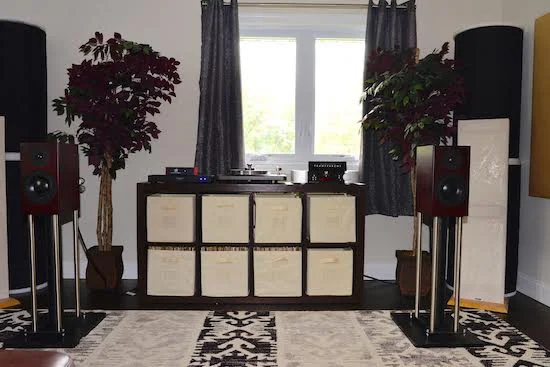 Room 1. “Good” / Entry level Audiophile System: VPI Cliffwood Turntable, Totem Signature One Speakers, VPI Cliffwood Phono, Ortofon 2M Red, Moon by Simaudio Integrated, Transparent Cable.