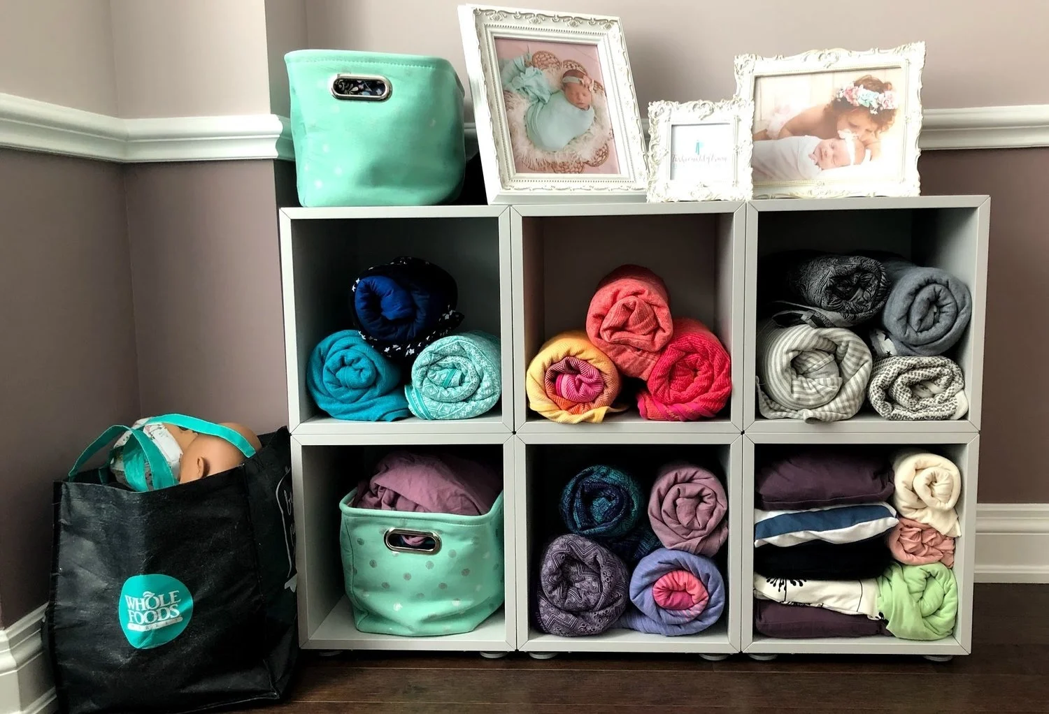 Avie’s large collection of woven baby wraps and stretchy wraps, from Didymos, Soul Slings, Boba, Baby K’tan and Huggaloops and weighted babywearing dolls.