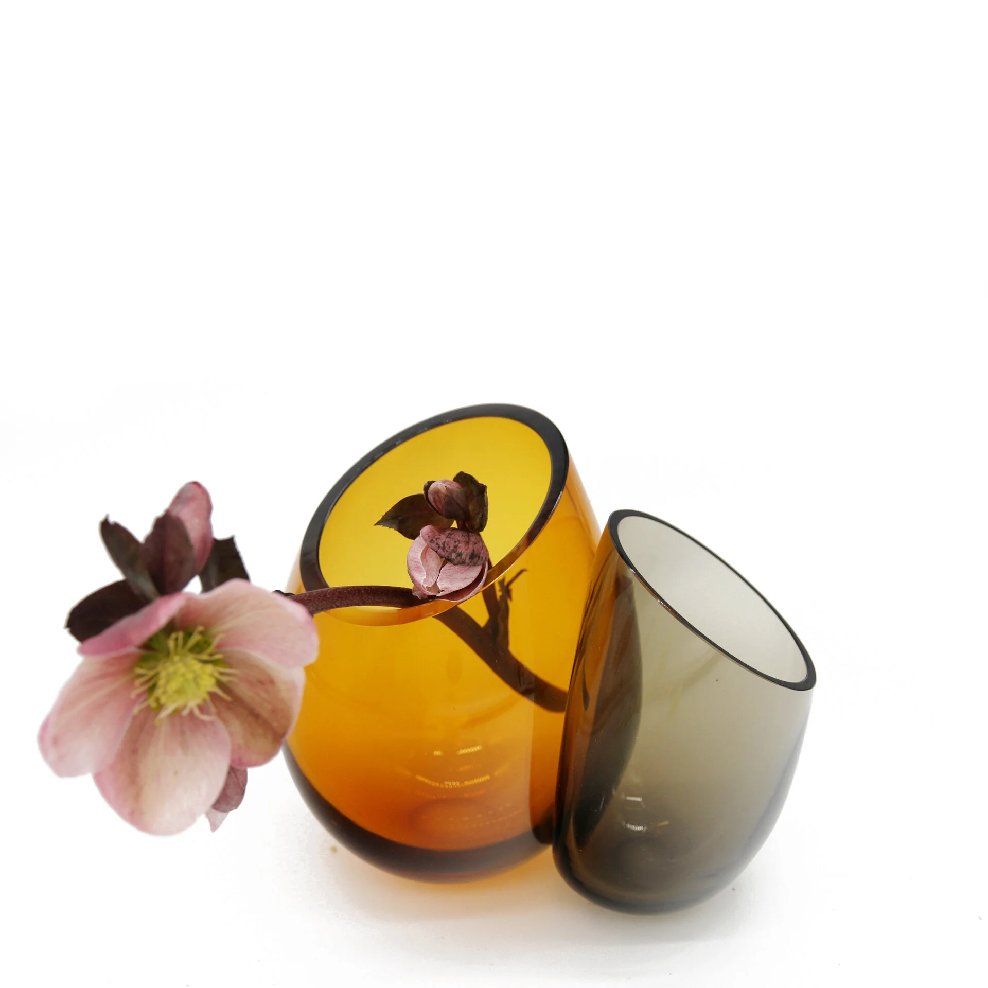 Aina Amber-Smoke with flower.jpg