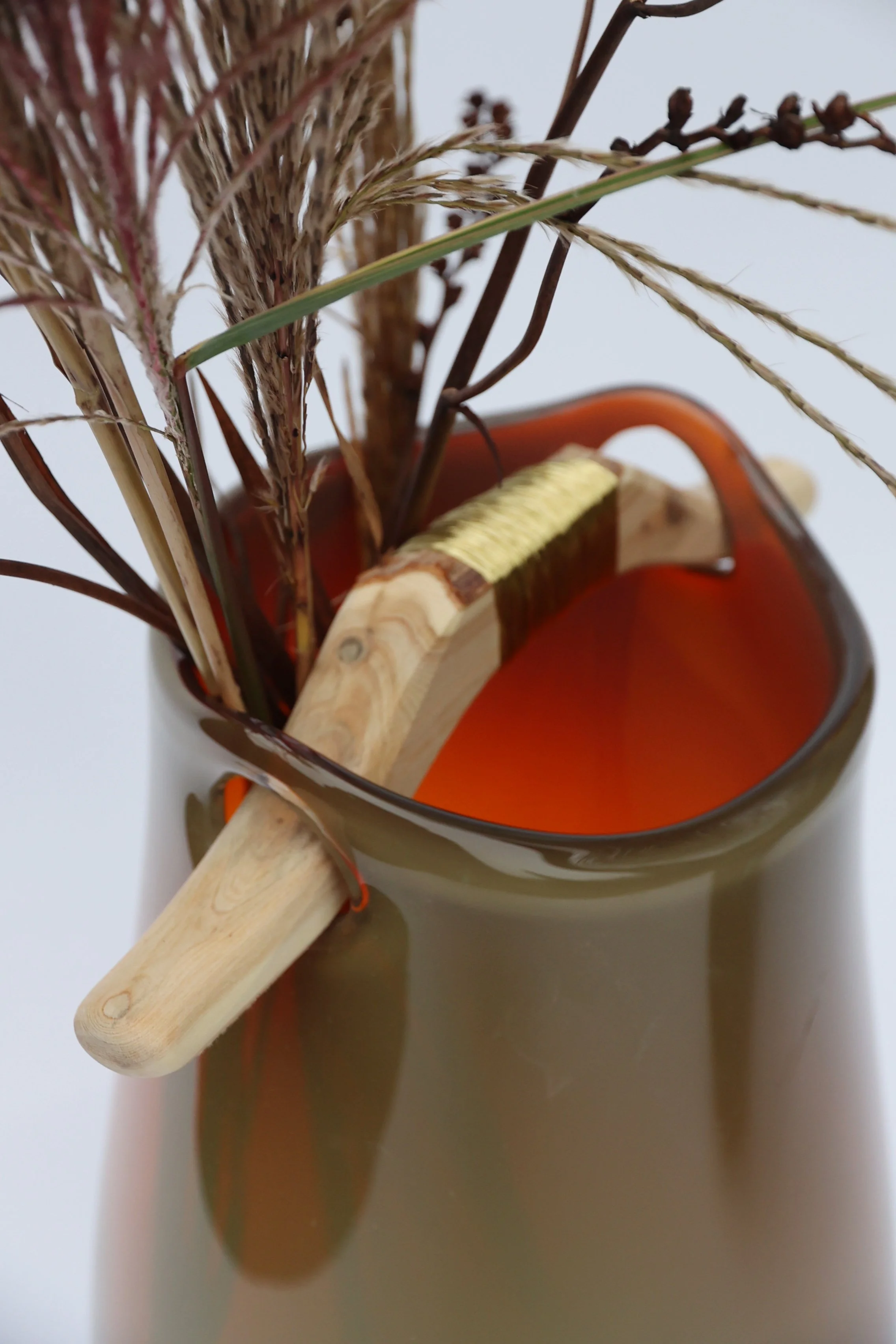 Heiki Handle with glwoing amber.jpg