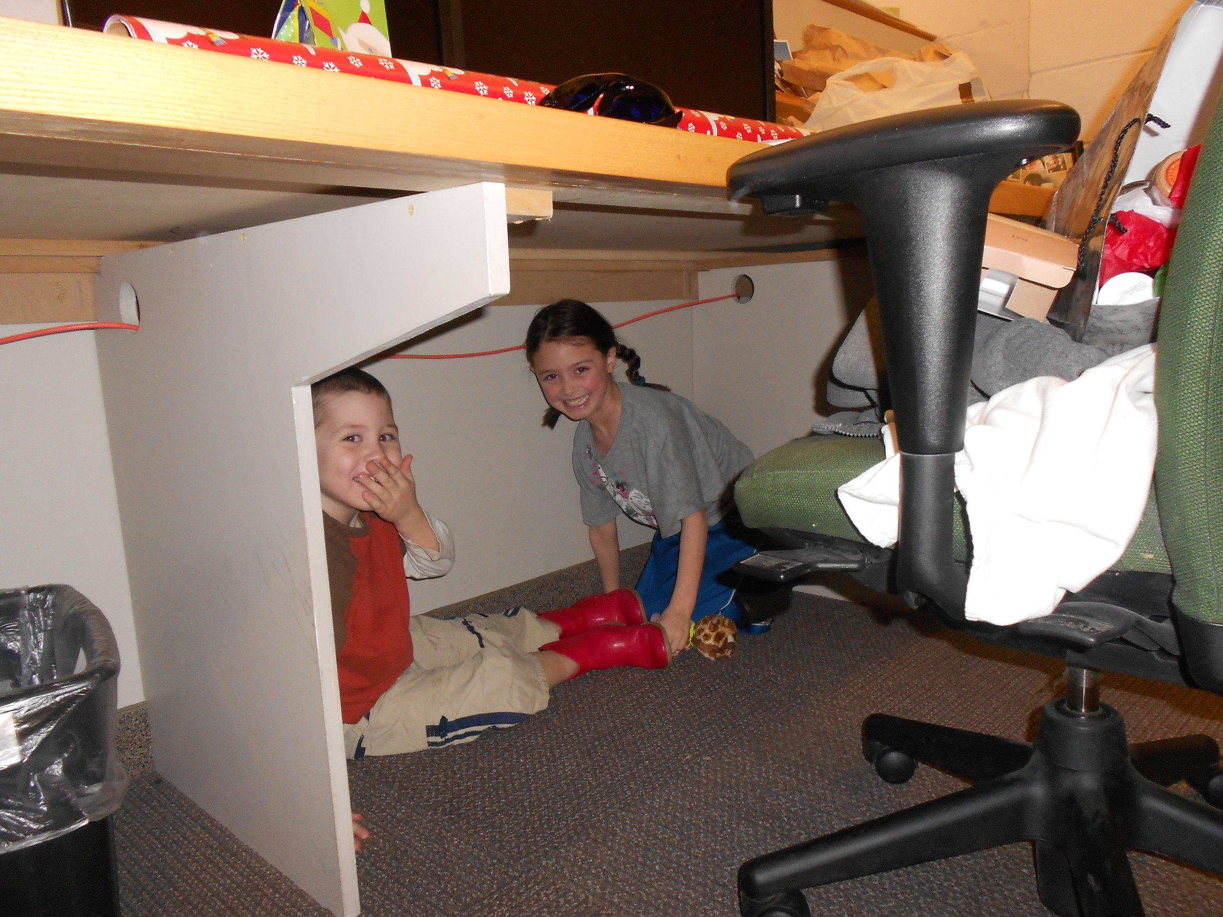 Kids under the desk