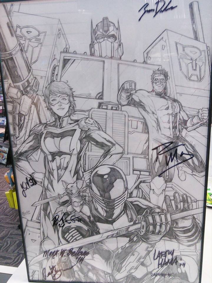 All the characters represented a different guest that year and we got them all to sign near their character. This piece has been on display at our store ever since.