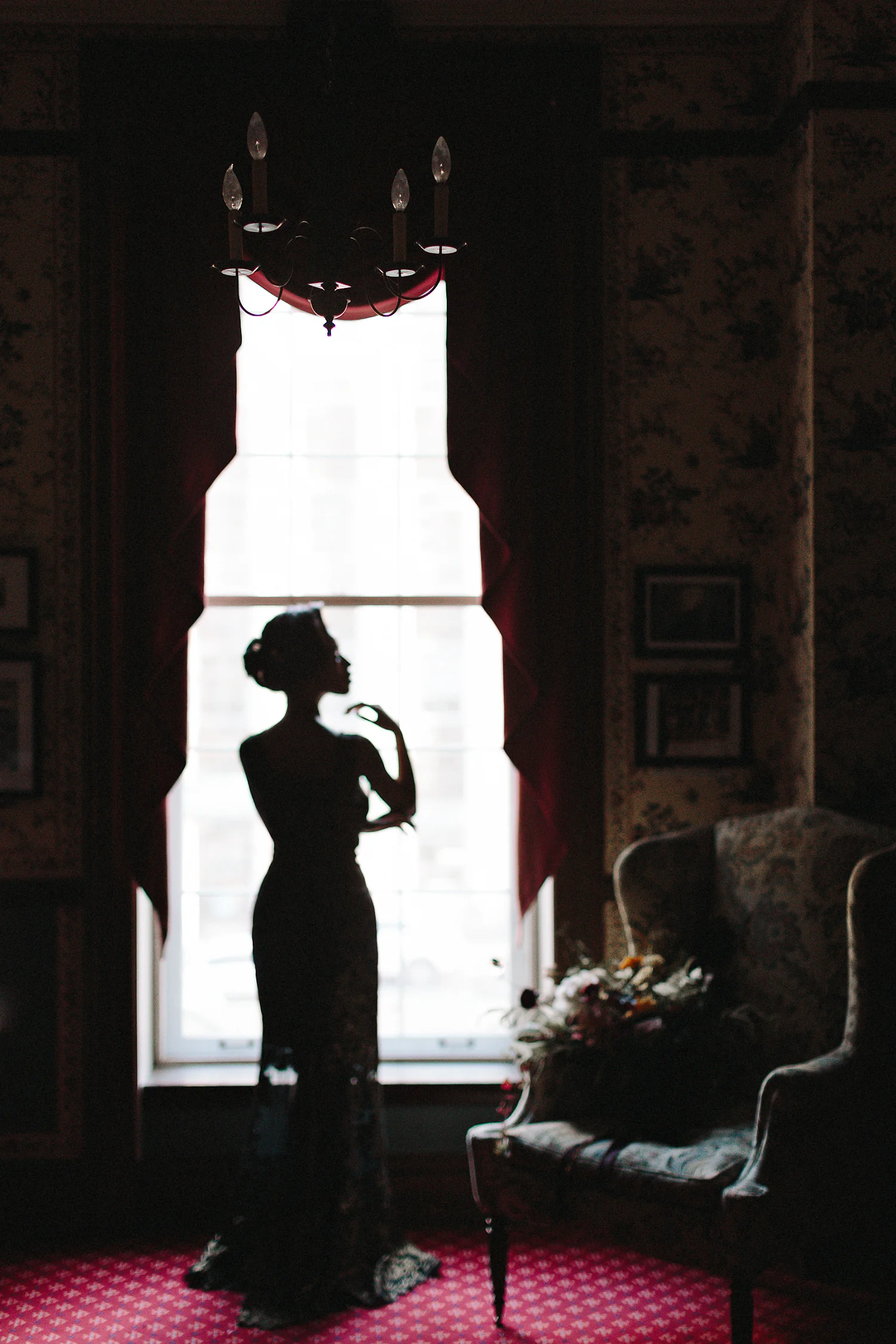 ryanne-hollies-photography-campbell-house-stylized-shoot-stairwell0wallpaper-editorial-high-fashion-portrait-vintage-bride-timeless-old-school-chair-hair-details-puzzle-creations-florals-hunt-and-gather-window-silhouette.jpg