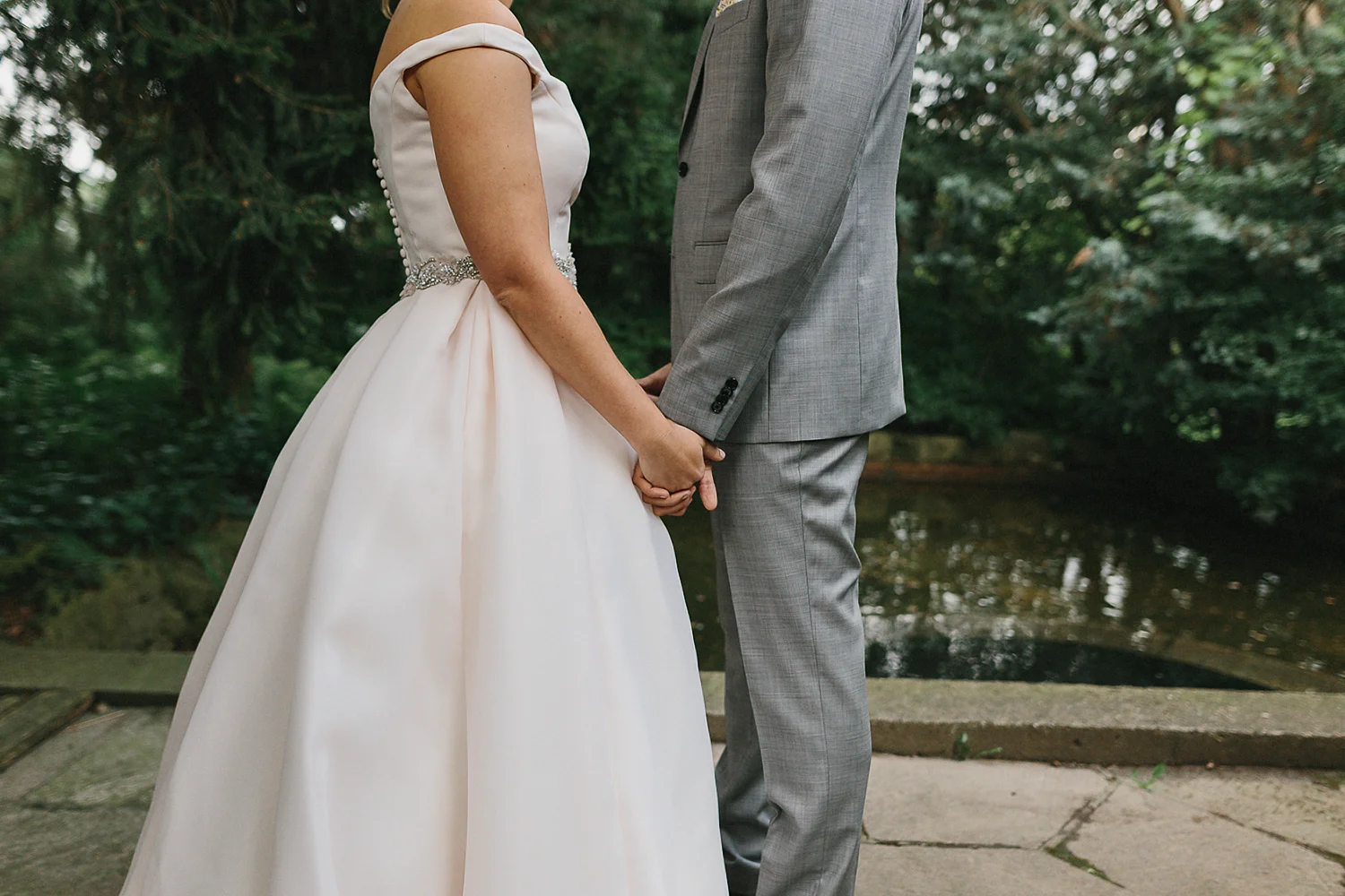 Graydon-Hall-Manor-Wedding-Toronto's-Best-Wedding-Photography-Ryanne-Hollies-Intimate-Small-Modern-Colourful-Wedding-candid-documentary-portraits-of-the-bride-and-groom-holding-hands-detail.jpg