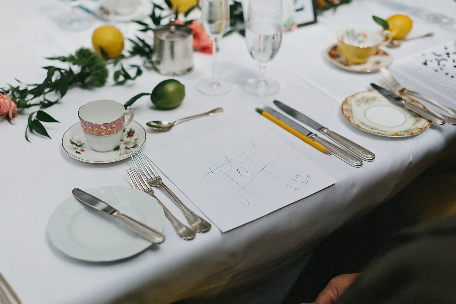 Graydon-Hall-Manor-Wedding-Toronto's-Best-Wedding-Photography-Ryanne-Hollies-Intimate-Small-Modern-Colourful-brunch-wedding-reception-guests-enjoying-games-x-and-os.jpg