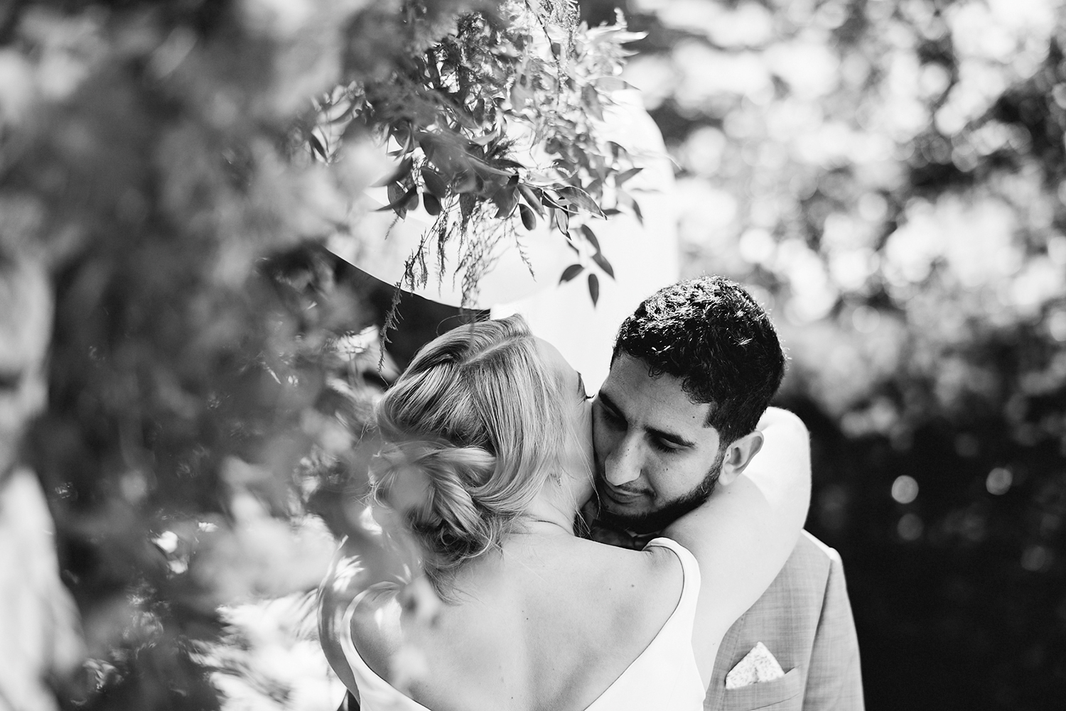 Graydon-Hall-Manor-Wedding-Toronto's-Best-Wedding-Photography-Ryanne-Hollies-Intimate-Small-Modern-Colourful-Wedding-reception-bride-and-groom-portraits-with-bubbles-floral-arch-hugging-romantic-and-sweet.jpg