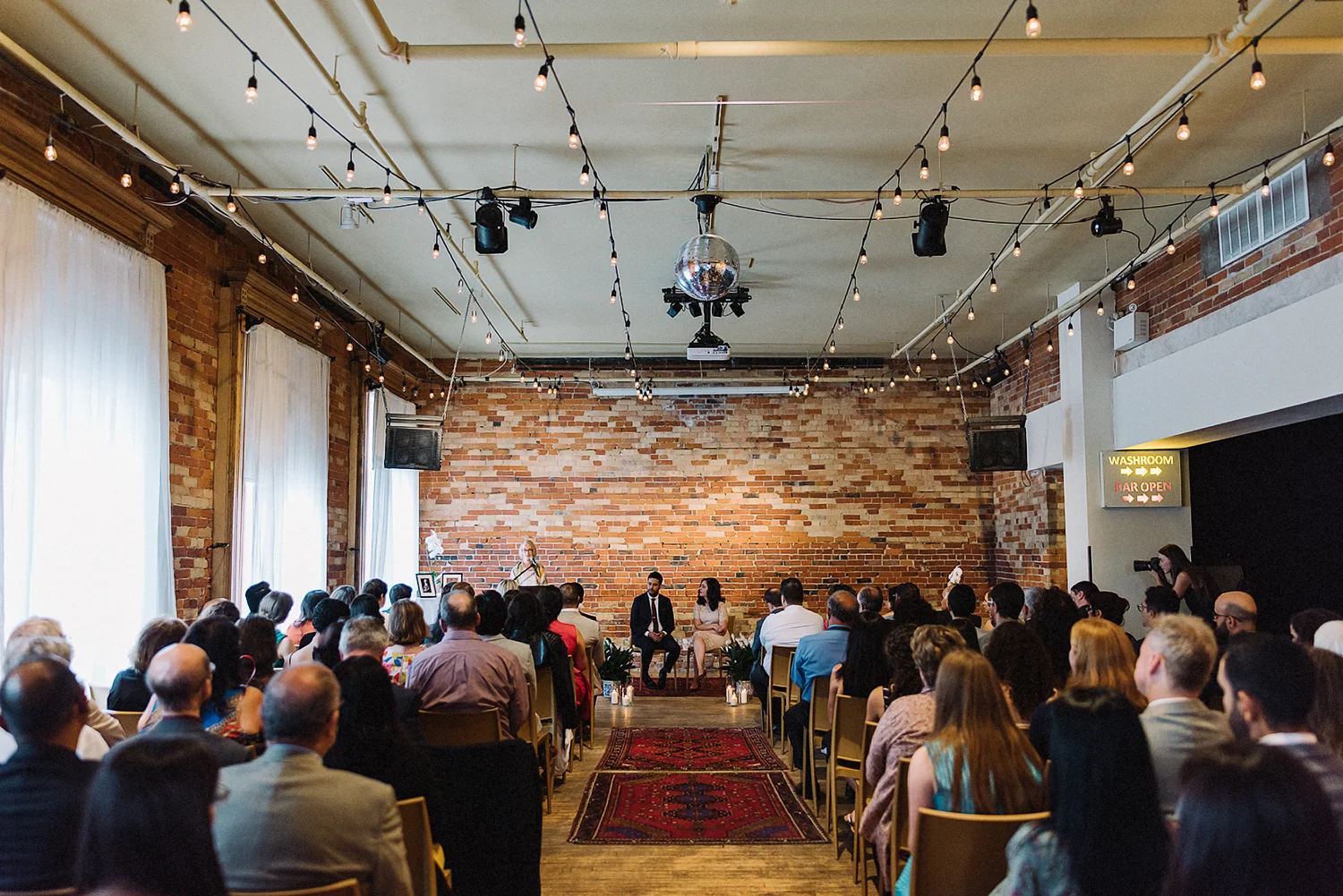 Best-Toronto-Wedding-Photographers-Afforadable-Candid-Photojournalistic-Photography-Toronto-Gladstone-Hotel-Wedding-Venue-Downtown-Urban-Brunch-Wedding-Inspiration-persian-ceremony-guests-mingling-at-Gladstone-Ceremony-Space.jpg