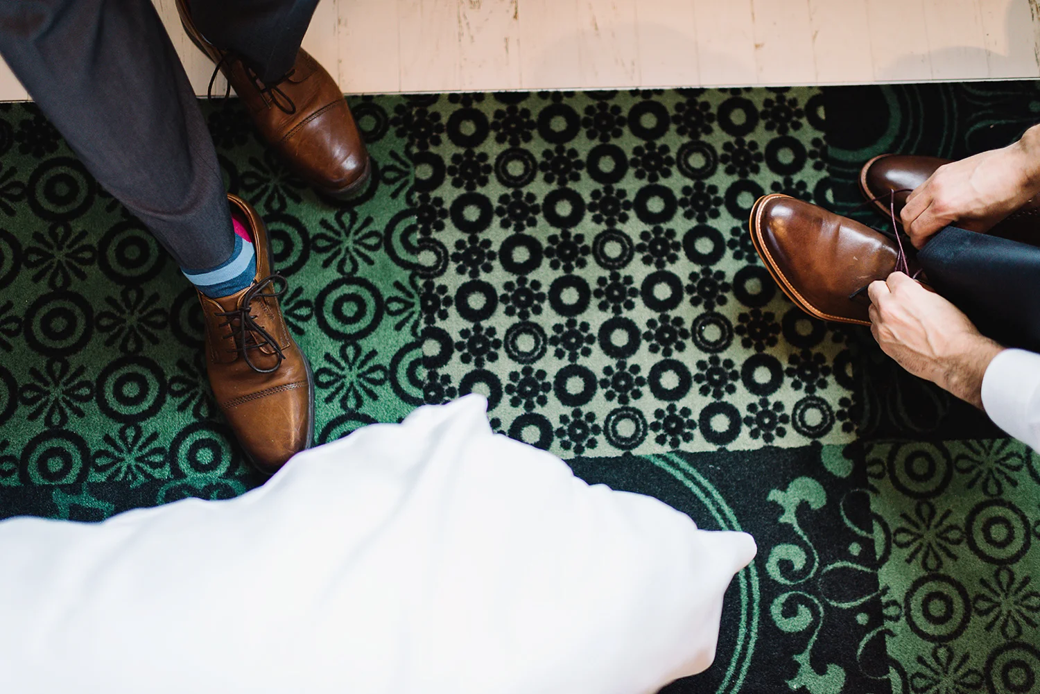 Prince-Edward-County-Drake-Hotel-Elopement-Ryanne-Hollies-Groom-Getting-Ready-tying-shoes.jpg