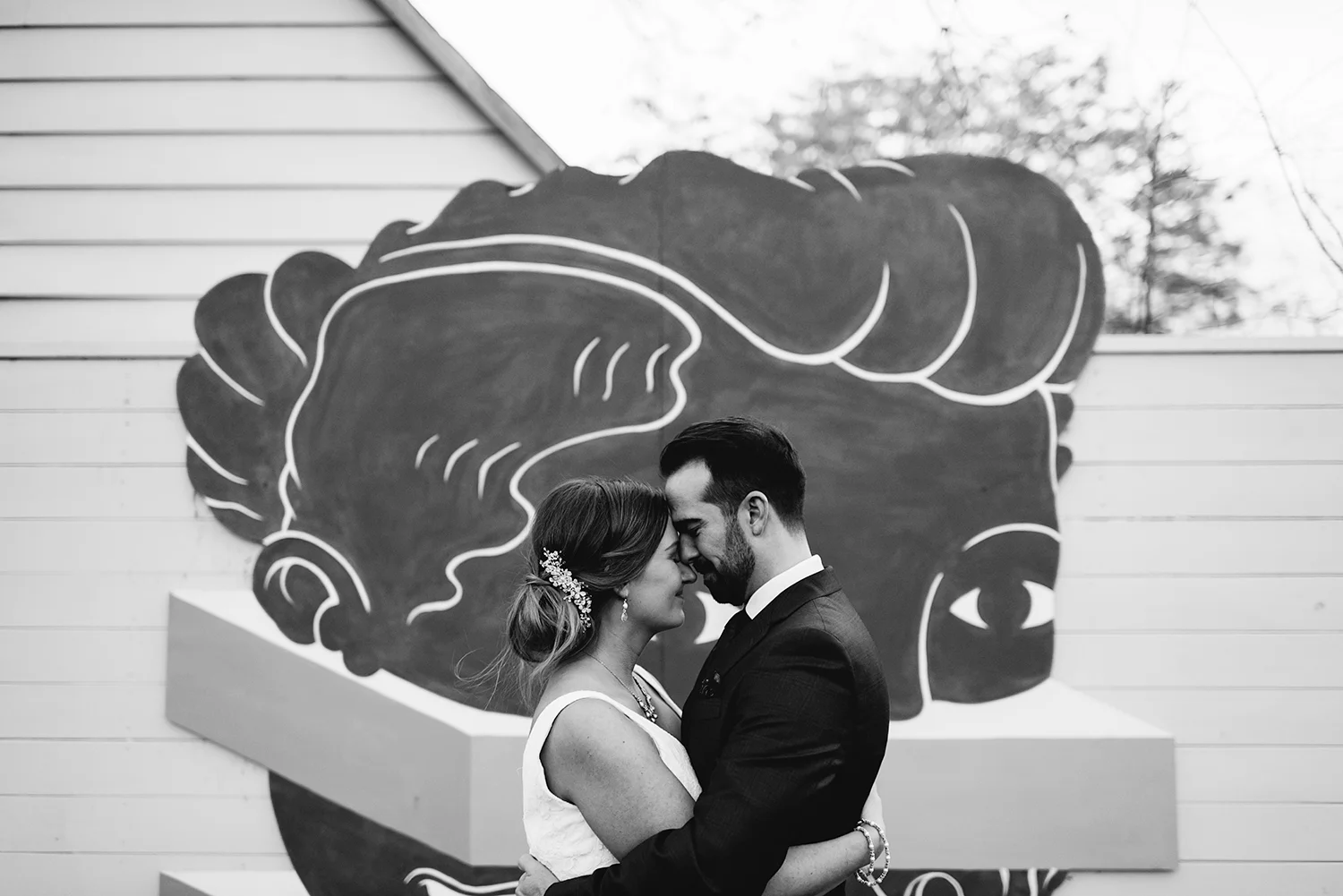 Prince-Edward-County-Wedding-Photographer-Drake-Hotel-Elopement-Venue-Sunset-Portrait-Hand-Detail-with-Artwork-bw.jpg
