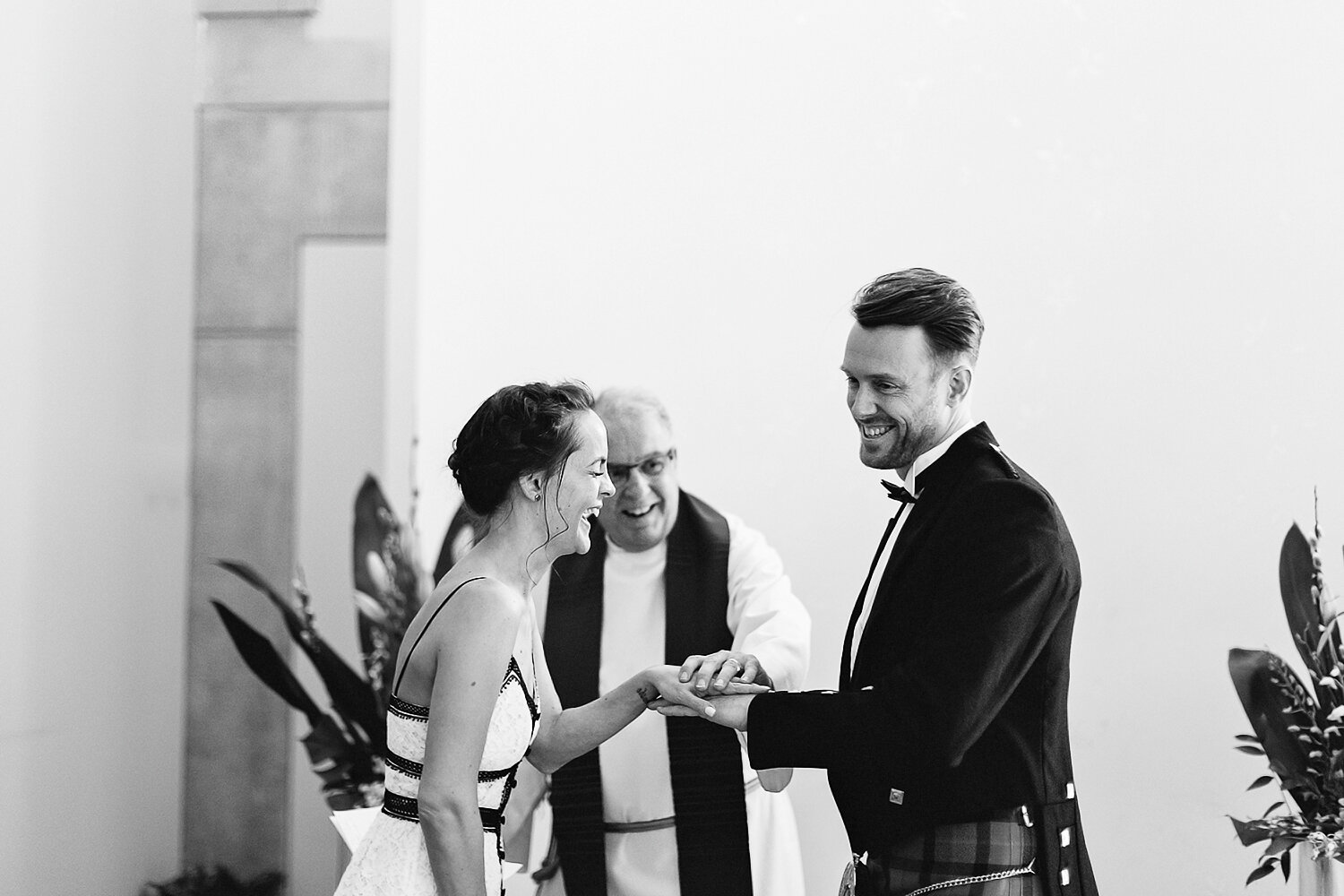 toronto-city-hall-elopement-wedding-old-city-hall-nathan-phillips-square-toronto-wedding-photographer-ryanne-hollies-photography-ceremony-city-hall-emotional-candid-moments-how-to-do-a-city-hall-wedding-toronto-vows-laughing-bride-and-groom.JPG