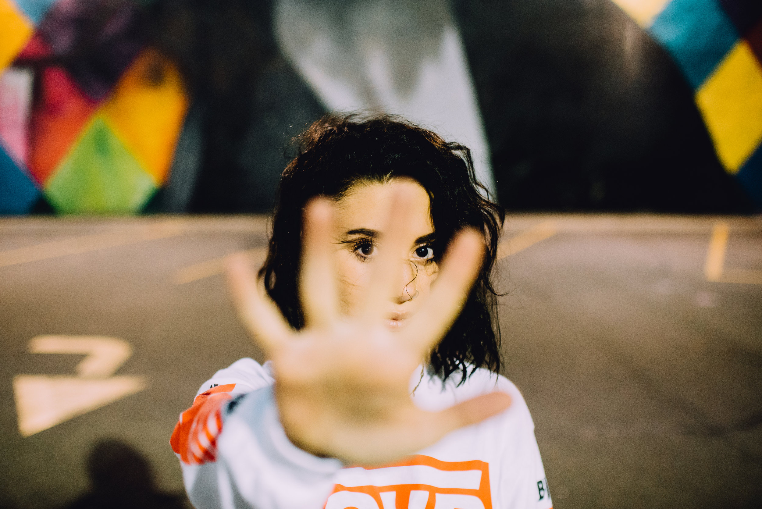 Christian-community-struggles-girl-puts-hand-out-keep-away