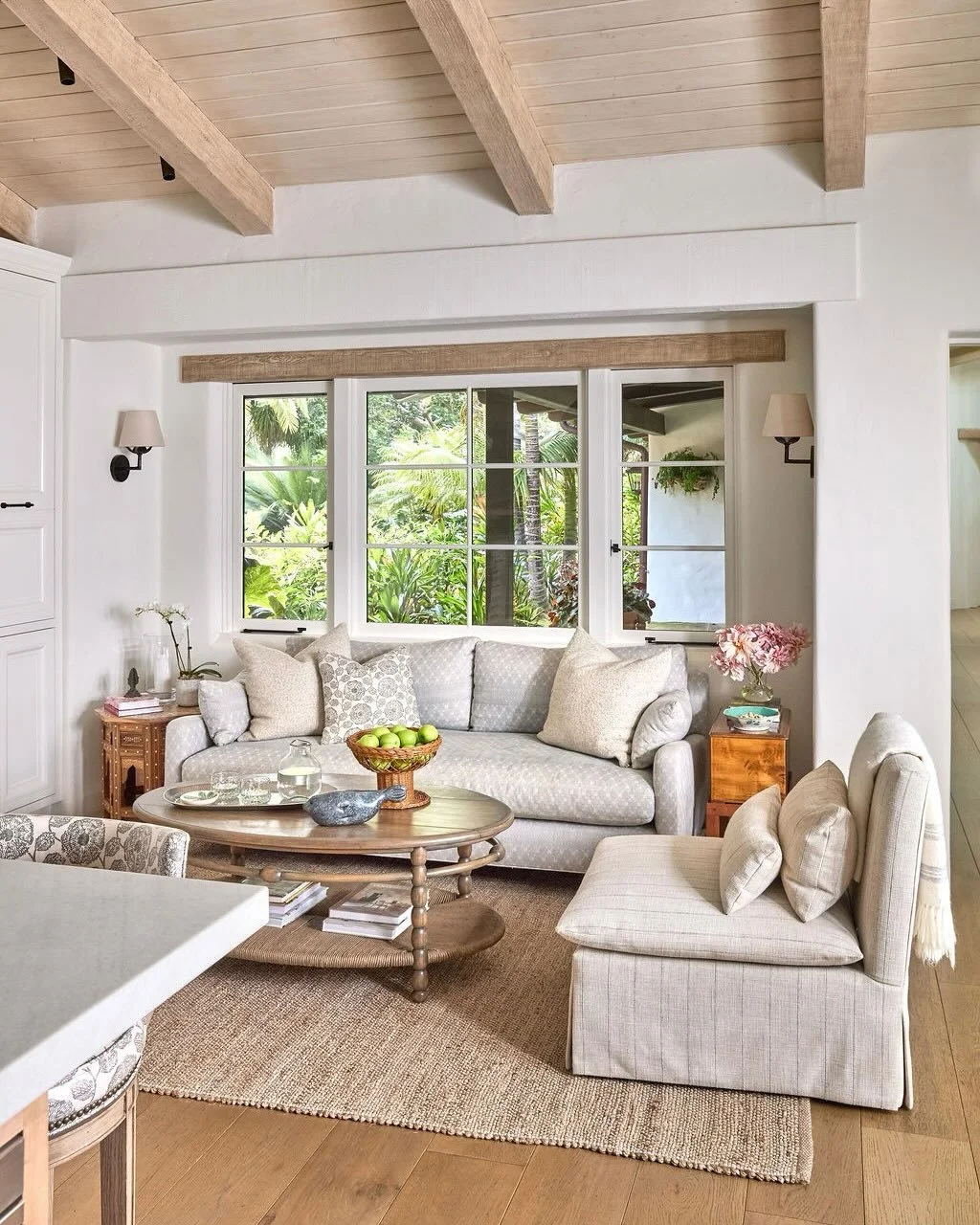 What was once a dining-heavy, underutilized space is now a light-filled family room designed for comfort, conversation, and everyday living.
By reworking the layout, and layering in texture, we designed a room that supports how this family lives, gat