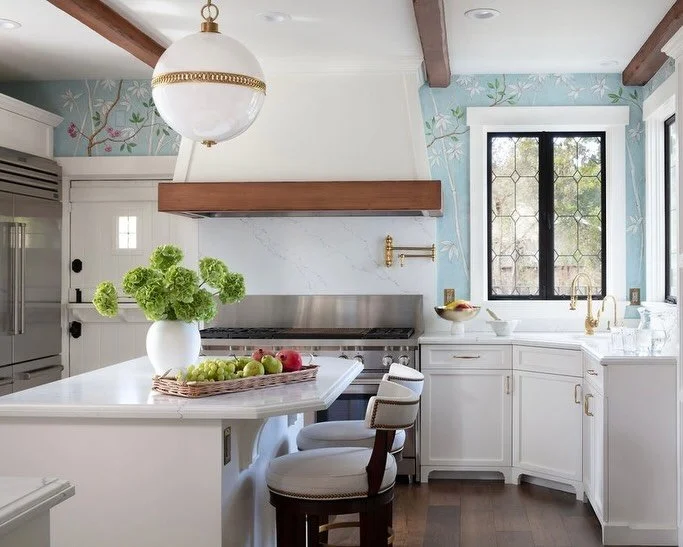 Here is how we transformed an existing white kitchen into something completely personal without any construction...
As you swipe between the before and after, you will notice the foundation stayed largely the same. The impact came from a handful of i