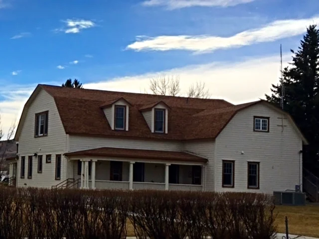 The original hospital building at Fort McKinney has been converted into an office building.