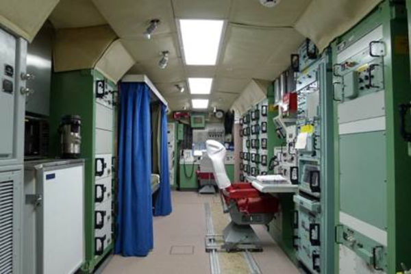 The underground interior of the alert facility conjures images of a submarine