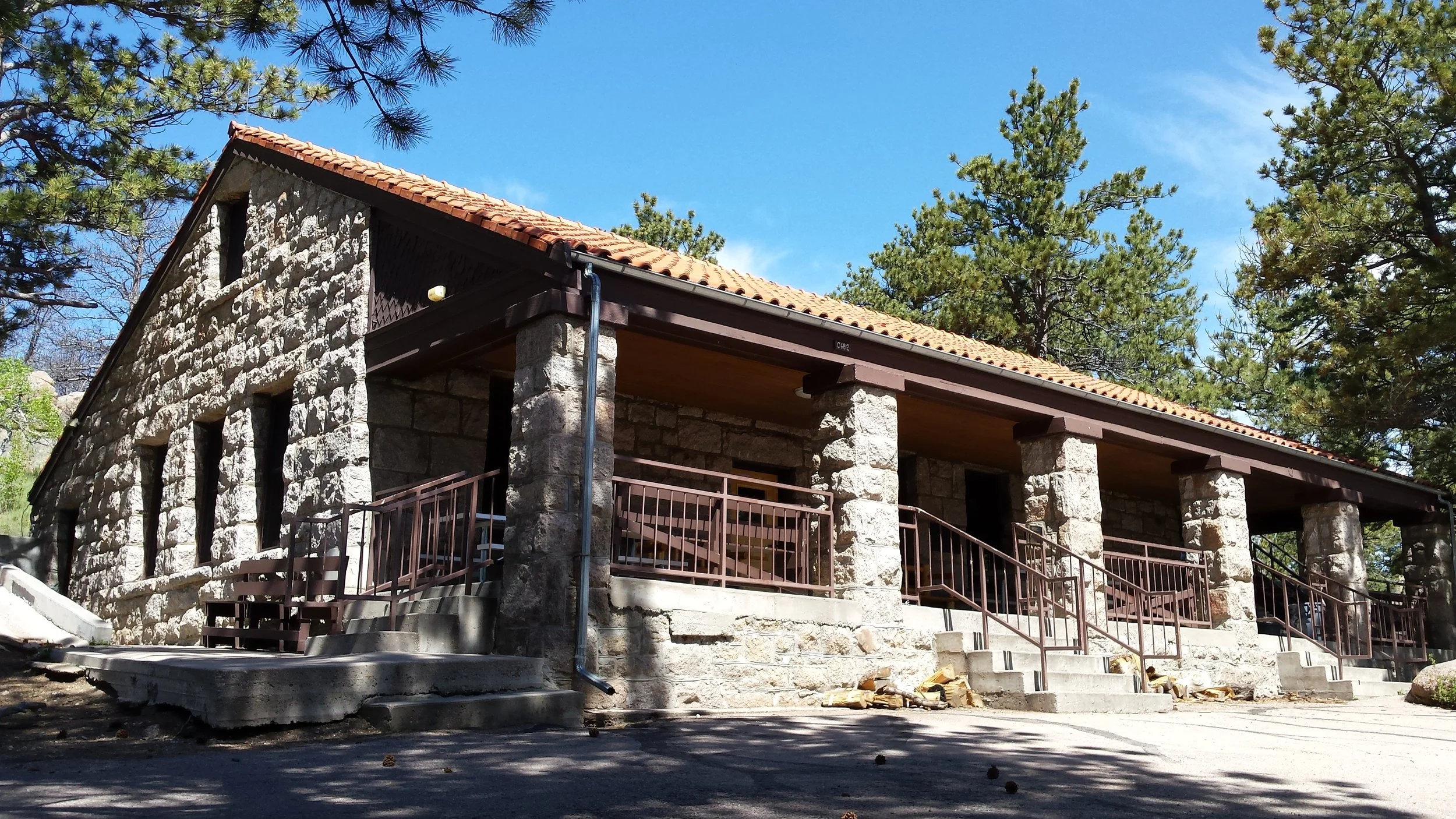Hynds Lodge is nestled against a hill amongst the trees north of Curt Gowdy State Park