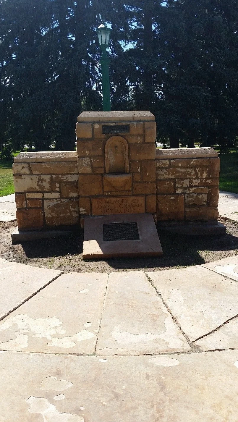 The Lowell O'Bryan memorial stands on the west lawn of Old Main.