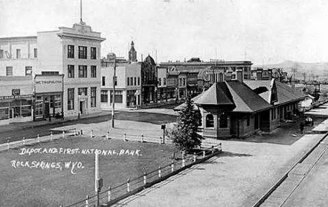 Front Street, downtown Rock Springs, 1919, showing the U.P. depot and the First National Bank. Wyoming Tales and Trails.
