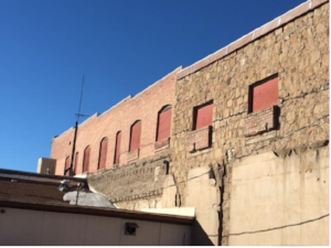 From this picture you can see the original sandstone on the right of the image and the "new" brick due to the fire on the left side. 