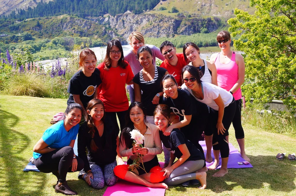 Post-yoga/Pilates posing with the bride at an Aprivé Wellness wedding retreat