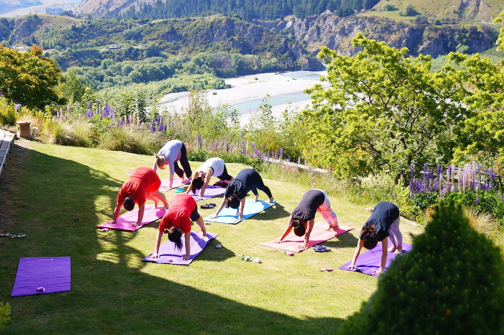 Yoga in paradise at an Aprivé Wellness wedding retreat