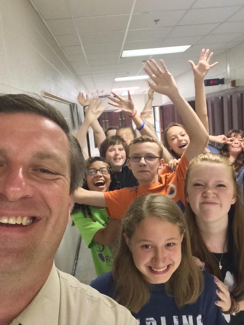 Photo provided by Tom Conway - Tom and his students celebrate their upcoming poetry slam.