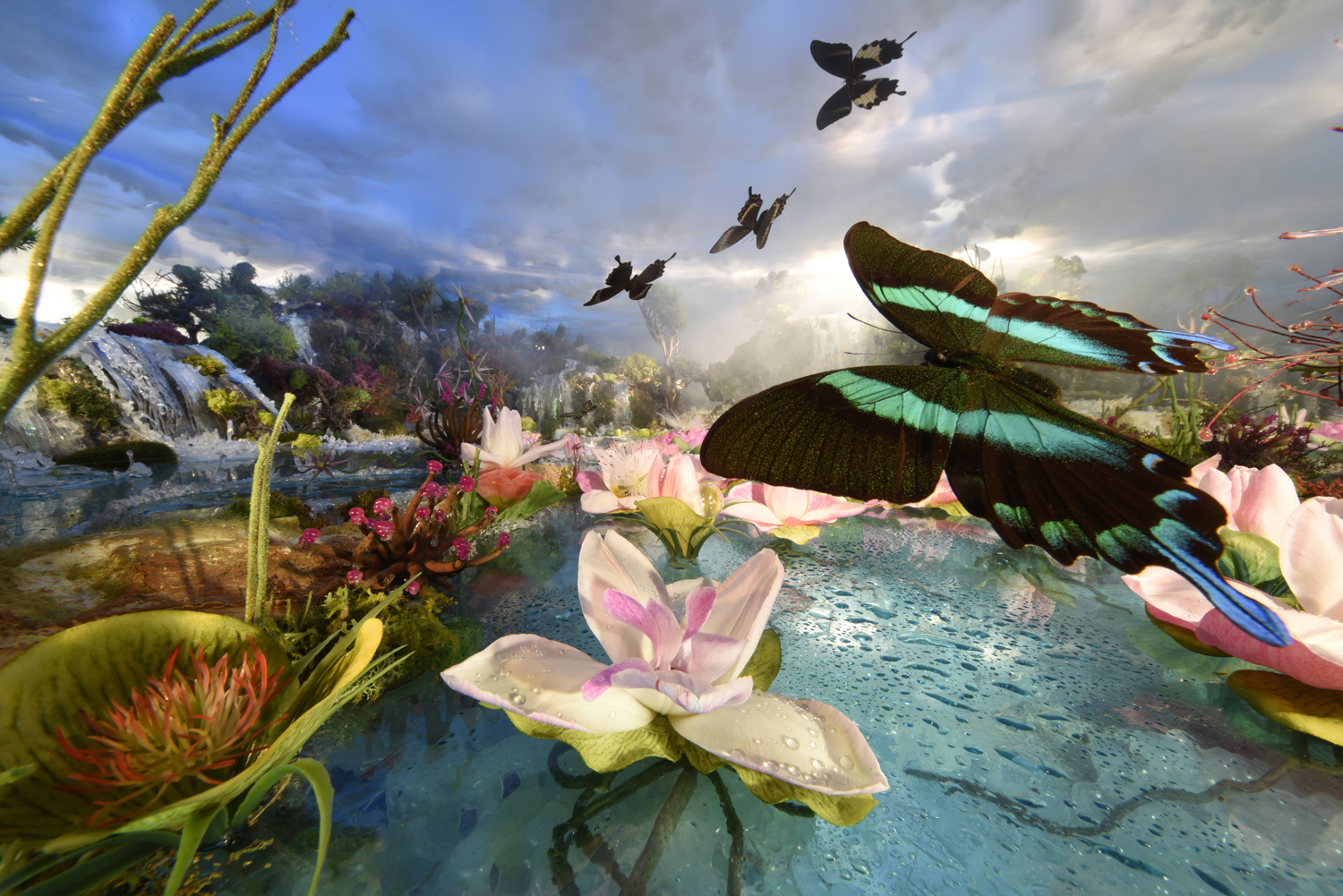 Green butterfly with pink lilies