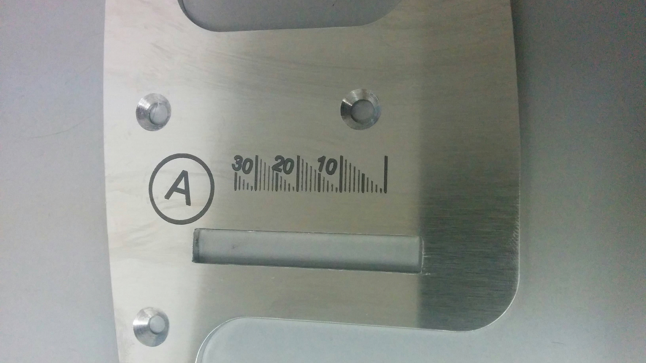 Laser marked metal guide