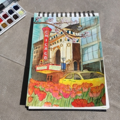Ink and watercolor plein air painting of the Chicago Theater