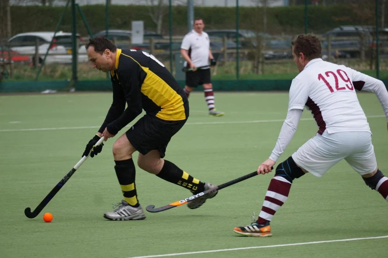 Ian Finn playing hockey for Fleet & Ewshot