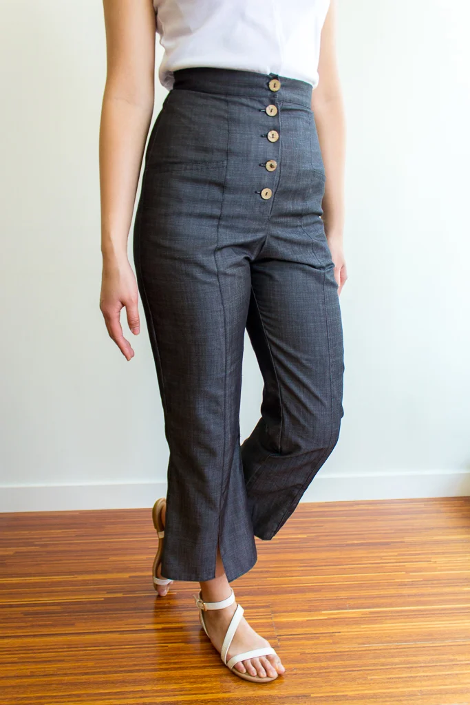 Vegan business casual black pants with button up front made from coconut shells.