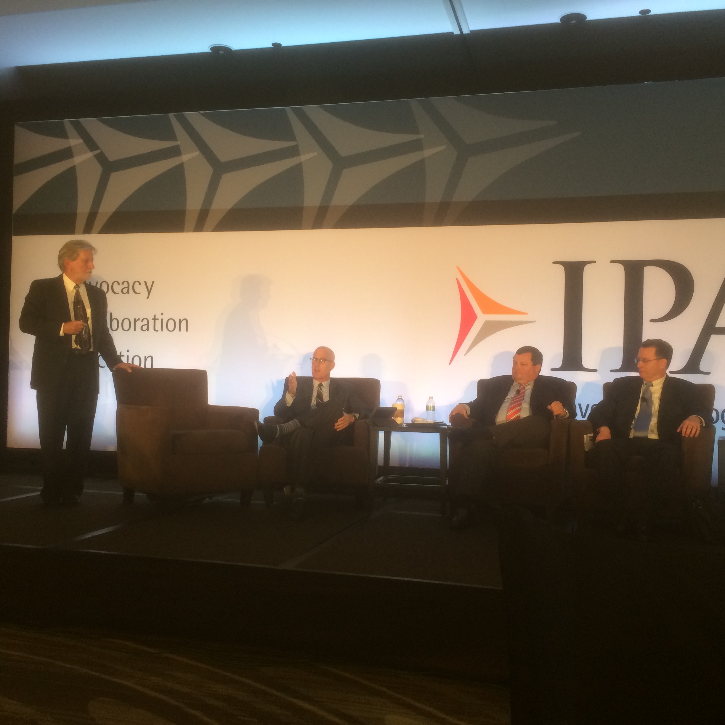 Nick "The Agility Doc" Horney, Ph.D., (left) facilitating a panel discussion at the 2015 Investment Program Association conference. 