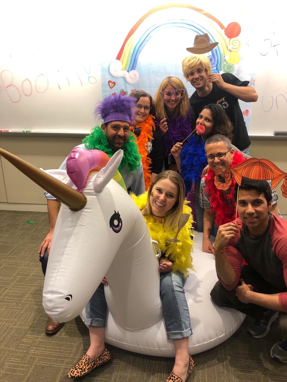 Lab photo with our honorary member Jamie the unicorn at the LGBTQ+ Happy Hour.