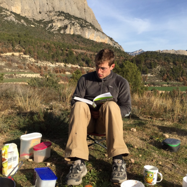 Felix, soaking up the wisdom of "The Book."